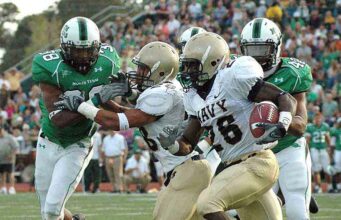 Kim Kardashian Shows Off Deep Cleavage In Plunging Top & Mini